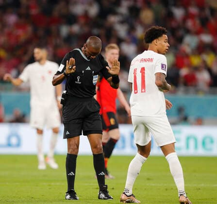 Belgium v Canada 2022 FIFA World Cup, WM, Weltmeisterschaft, Fussball Referee Janny Sikazwe signals to Tajon Buchanan of Canada during the 2022 FIFA World Cup Group F match at Ahmad Bin Ali Stadium, Al-Rayyan Content Not Available For UK Newspapers Copyright: xPaulxChestertonx FIL-17640-0038 UK Newspapers OUT