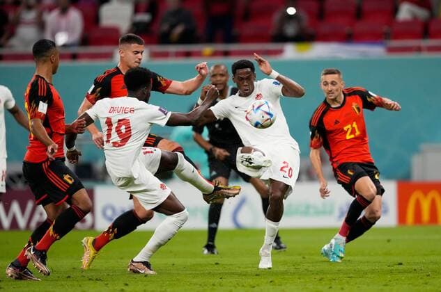 Mandatory Credit: Photo by Dave Shopland Shutterstock (13626494w) Jonathan David of Canada clears Belgium v Canada, FIFA World Cup, WM, Weltmeisterschaft, Fussball 2022, Group F, Football, Ahmad Bin Ali Stadium, Ar-Rayyan, Qatar - 23 Nov 2022 Editorial Use Only Belgium v Canada, FIFA World Cup 2022, Group F, Football, Ahmad Bin Ali Stadium, Ar-Rayyan, Qatar - 23 Nov 2022 Editorial Use Only Copyright: xDavexShopland Shutterstockx 13626494w