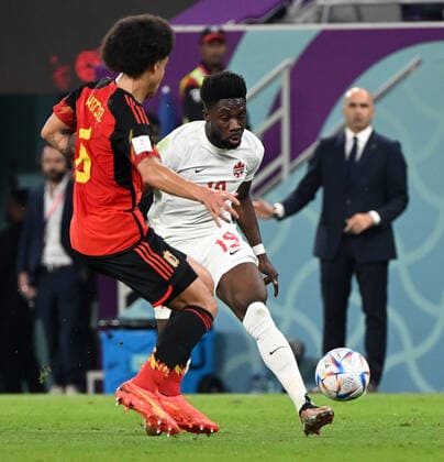 Football, Men, 2022 23 season, World Cup in Qatar, Group F 1 matchday , Belgium Canada at Ahmed bin Ali Stadium in Ar Rayyan, f l Axel Witsel Belgium , Alphonso Davies Canada , 23 11 2022, Copyright: xMatthiasxKochx