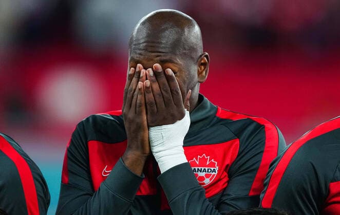 Mandatory Credit: Photo by Javier Garcia Shutterstock (13626489aa) Kamal Miller of Canada is emotional after the National anthem Belgium v Canada, FIFA World Cup, WM, Weltmeisterschaft, Fussball 2022, Group F, Football, Ahmad Bin Ali Stadium, Ar-Rayyan, Qatar - 23 Nov 2022 Editorial Use Only Belgium v Canada, FIFA World Cup 2022, Group F, Football, Ahmad Bin Ali Stadium, Ar-Rayyan, Qatar - 23 Nov 2022 Editorial Use Only  Copyright: xJavierxGarcia Shutterstockx 13626489aa