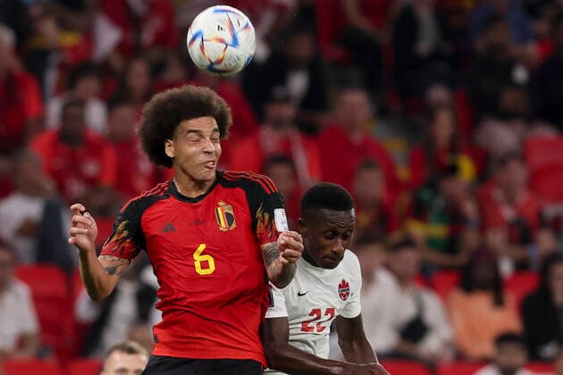 Belgium s Axel Witsel and Canadian Richie Laryea pictured in action during a soccer game between Belgium s national team, Nationalteam the Red Devils and Canada, in Group F of the FIFA 2022 World Cup in Al Rayyan, State of Qatar on Wednesday 23 November 2022. BRUNOxFAHY  x53211831x