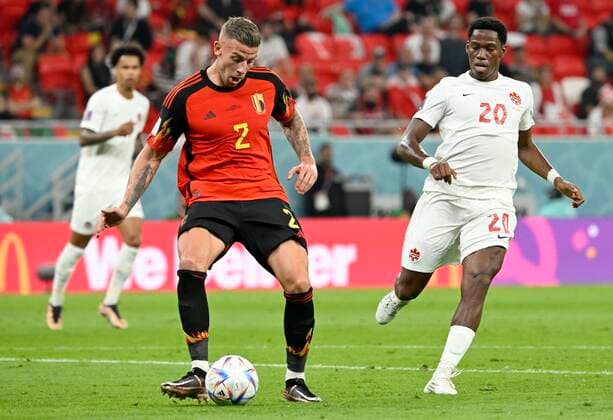 DOHA, QATAR - NOVEMBER 23 : Alderweireld Toby defender of Belgium & David Jonathan forward of Canada during the FIFA World Cup, WM, Weltmeisterschaft, Fussball Qatar 2022 Groupe F match between Belgium and Canada at the Ahmad Bin Ali Stadium on November 23, 2022 in Doha, Qatar, 23 11 2022 ( Belgium v Canada - FIFA World Cup Qatar 2022 PhotoNews Panoramic 