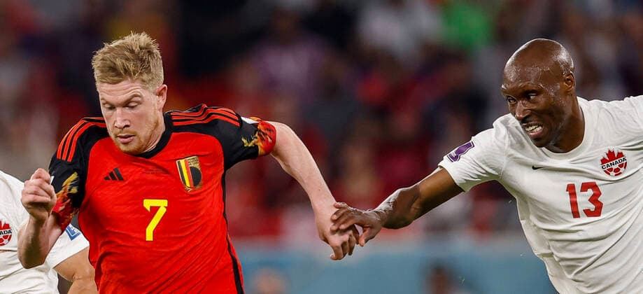 belgium vs canada AL-RAYYAN, AR - 23.11.2022: BELGIUM VS CANADA - DE BRUYNE Kevin of Belgium disputes the ball with HUTCHINSON Atiba of Canada during the match between Belgium and Canada, valid for the first round of the group stage of the World Cup, held at the Ahmed bin Ali Stadium in Al-Rayyan, Qatar. (Photo: Marcelo Machado de Melo Fotoarena) x2297940x  MarceloxMachadoxdexMelo