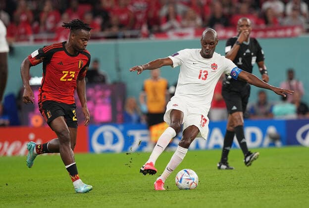 QAT, World Cup FIFA 2022, Group F, Belgium vs Canada 23 11 2022, Khalifa International Stadium, Doha, QAT, World Cup FIFA 2022, Group F, Belgium vs Canada, in picture Belgium s forward Michy Batshuayi , Canada s defender Kamal Miller nordphotoxGmbHx xBratic nph00250