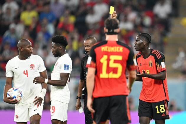 DOHA, QATAR - NOVEMBER 23 : Onana Amadou midfielder of Belgium is shown a yellow card during the FIFA World Cup, WM, Weltmeisterschaft, Fussball Qatar 2022 Groupe F match between Belgium and Canada at the Ahmad Bin Ali Stadium on November 23, 2022 in Doha, Qatar, 23 11 2022 ( Belgium v Canada - FIFA World Cup Qatar 2022 PhotoNews Panoramic 