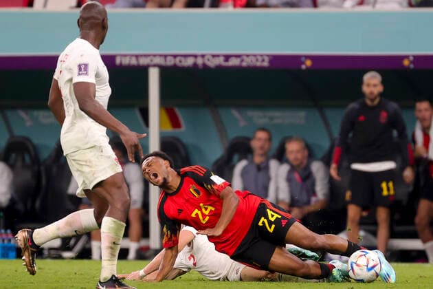 Belgium s Lois Openda lays down and Canadian Alistair Johnston gets a yellow card for this tackle at a soccer game between Belgium s national team, Nationalteam the Red Devils and Canada, in Group F of the FIFA 2022 World Cup in Al Rayyan, State of Qatar on Wednesday 23 November 2022. VIRGINIExLEFOUR  x53224161x