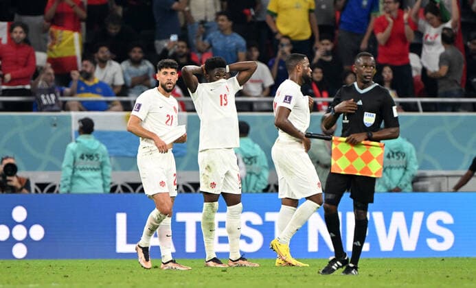 Football, Men, 2022 23 season, World Cup in Qatar, Group F 1 matchday , Belgium Canada at Ahmed bin Ali Stadium in Ar Rayyan, f l Jonathan Osorio Canada , Alphonso Davies Canada , Cyle Larin Canada , disappointment after final whistle, 23 11 2022, Copyright: xMatthiasxKochx