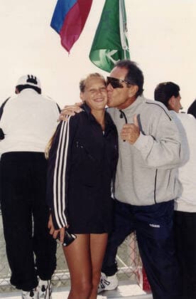 Russian tennis player Anna Kournikova kissed by Nick Bollettieri, Orange Bowl, 1995 