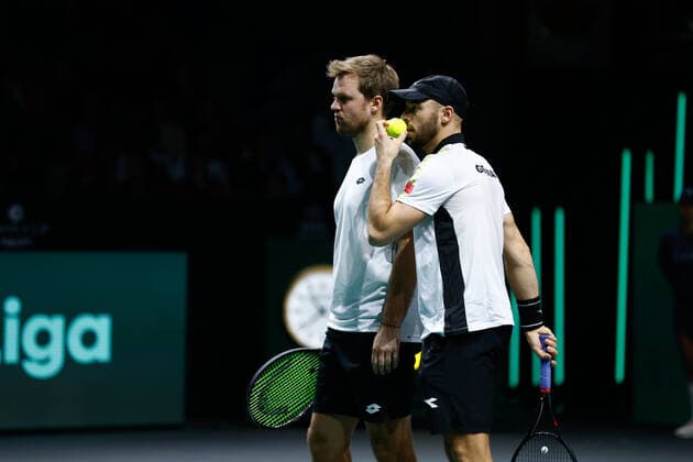November 24, 2022, MALAGA, MADRID, SPAIN: Kevin Krawietz and Tim Puetz of Germany play doubles against Vasek Pospisil and Denis Shapovalov of Canada during the third doubles tennis match from Davis Cup Finals 2022, Quarter-Finals round, played between Germany and Canada at Palacio de Deportes Martin Carpena pavilion on november 24, 2022, in Malaga, Spain. MALAGA SPAIN - ZUMAa181 20221124_zaa_a181_182 Copyright: xOscarxJ.xBarrosox