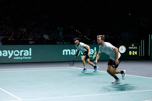 November 24, 2022, MALAGA, MADRID, SPAIN: Kevin Krawietz and Tim Puetz of Germany play doubles against Vasek Pospisil and Denis Shapovalov of Canada during the third doubles tennis match from Davis Cup Finals 2022, Quarter-Finals round, played between Germany and Canada at Palacio de Deportes Martin Carpena pavilion on november 24, 2022, in Malaga, Spain. MALAGA SPAIN - ZUMAa181 20221124_zaa_a181_185 Copyright: xOscarxJ.xBarrosox