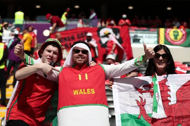 Mandatory Credit: Photo by Michael Zemanek Shutterstock (13634746e) Welsh fans Wales v Iran, FIFA World Cup, WM, Weltmeisterschaft, Fussball 2022, Group B, Football, Ahmad Bin Ali Stadium, Ar-Rayyan, Qatar - 25 Nov 2022 Editorial Use Only Wales v Iran, FIFA World Cup 2022, Group B, Football, Ahmad Bin Ali Stadium, Ar-Rayyan, Qatar - 25 Nov 2022 Editorial Use Only  Copyright: xMichaelxZemanek Shutterstockx 13634746e