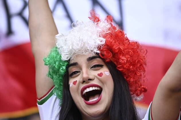 Foto Fabio Ferrari LaPresse 25 Novembre 2022 Qatar - - Calcio - Qatar 2022 - Coppa del Mondo Fifa - Galles vs Iran - Gruppo B - Fase a Gironi - Ahmad Bin Ali Stadium. Nella foto: la tifoseria iraniana November 25, 2022 , Qatar - sport - Soccer - Qatar 2022- FIFA World Cup, WM, Weltmeisterschaft, Fussball - Walles v Iran - Group B - group stage - Ahmad Bin Ali Stadium. In the pic: iranian fans  Copyright: xFabioxFerrari LaPressex