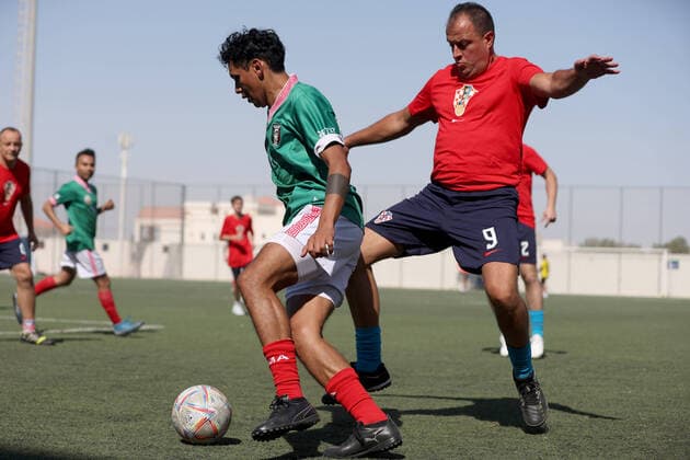 Match between Croatian and Mexican supporters: FIFA World Cup, WM, Weltmeisterschaft, Fussball Qatar 2022 Croatian and Mexican fans during the match between Croatia and Mexico supporters at the Fifa Fan Festival at GEMS Wellington School on November 25, 2022., in Doha, Qatar. IgorxKralj PIXSELL