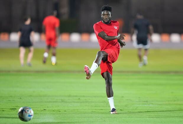 November 25, 2022, DOHA, QATAR: Canada star Alphonso Davies kicks the ball during practice at the World Cup in Doha, Qatar, Friday, Nov. 25, 2022. Canada News - November 25, 2022  - ZUMAc35_ 20221125_zaf_c35_028 Copyright: xNathanxDenettex