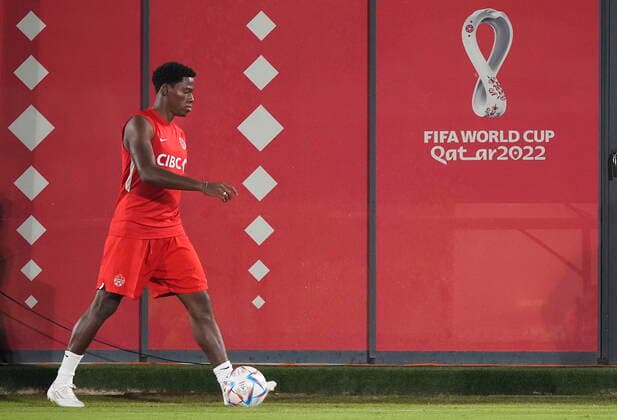 November 25, 2022, DOHA, QATAR: Canada forward Jonathan David walks to the stretching area during practice at the World Cup in Doha, Qatar, Friday, Nov. 25, 2022. Canada News - November 25, 2022  - ZUMAc35_ 20221125_zaf_c35_036 Copyright: xNathanxDenettex
