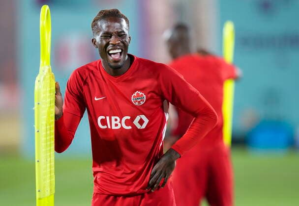 November 25, 2022, DOHA, QATAR: Canada forward Ike Ugbo laughs during practice at the World Cup in Doha, Qatar, Friday, Nov. 25, 2022. Canada News - November 25, 2022  - ZUMAc35_ 20221125_zaf_c35_044 Copyright: xNathanxDenettex