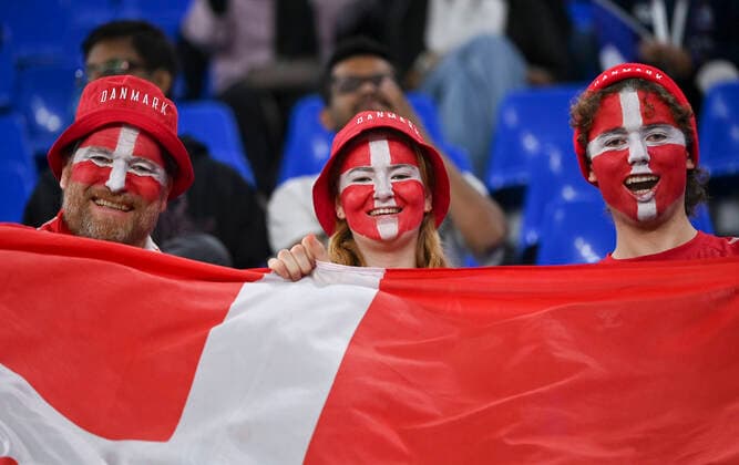 (221126) -- DOHA, Nov. 26, 2022 -- Fans of Denmark react before the Group D match between France and Denmark at the 2022 FIFA World Cup, WM, Weltmeisterschaft, Fussball at Ras Abu Aboud (974) Stadium in Doha, Qatar, Nov. 26, 2022. ) (SP)QATAR-DOHA-2022 WORLD CUP-GROUP D-FRA VS DEN ChenxCheng 