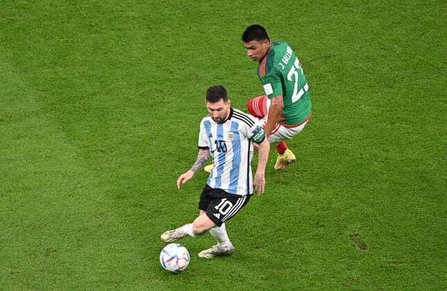 Football, Men, 2022 23 season, World Cup in Qatar, Group C 2 matchday , Argentina Mexico at Lusail Iconic Stadium in Lusail, v l Lionel Messi Argentina , Jesus Gallardo Mexico , 26 11 2022, Copyright: xMatthiasxKochx