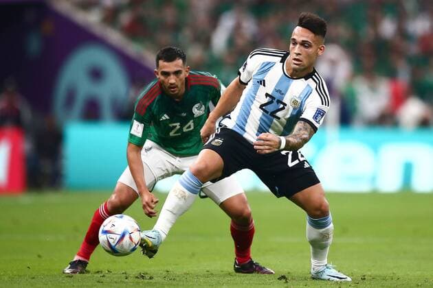 Mandatory Credit: Photo by Michael Zemanek Shutterstock (13634795w) Lautaro Martinez of Argentina under pressure from Luis Chavez of Mexico Argentina v Mexico, FIFA World Cup, WM, Weltmeisterschaft, Fussball 2022, Group C, Football, Lusail Stadium, Al Daayen, Qatar - 26 Nov 2022 Editorial Use Only Argentina v Mexico, FIFA World Cup 2022, Group C, Football, Lusail Stadium, Al Daayen, Qatar - 26 Nov 2022 Editorial Use Only Copyright: xMichaelxZemanek Shutterstockx 13634795w