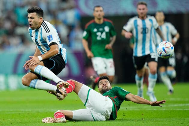 Argentina v Mexico: Group C - FIFA World Cup, WM, Weltmeisterschaft, Fussball Qatar 2022 Nestor Araujo centre-back of Mexico and CF America and Marcos Acuna left-back of Argentina and Sevilla FC compete for the ball during the FIFA World Cup Qatar 2022 Group C match between Argentina and Mexico at Lusail Stadium on November 26, 2022 in Lusail City, Qatar. Lusail City Qatar  Copyright: xJosexBretonx originalFilename:breton-argentin221126_npDAr.jpg