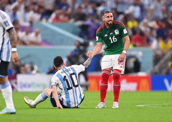 FOOTBALL World Cup 2022 PRE-ROUND GROUP C Argentina Mexico 26 11 2022 Hector Herrera right, Mexico helps Lionel Messi left, Argentina to his feet
