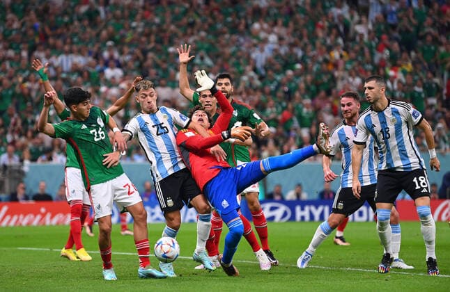 FOOTBALL World Cup 2022 PRE-ROUND GROUP C Argentina Mexico 26 11 2022 Kevin Alvarez li and goalkeeper Guillermo Ochoa 3 v l , both Mexico vs Lisandro Martinez 2 v l , Argentina