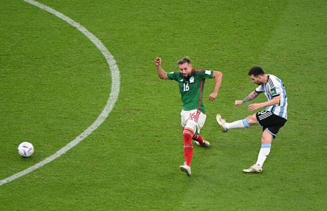 Football, Men, 2022 23 season, World Cup in Qatar, Group C 2 matchday , Argentina Mexico at Lusail Iconic Stadium in Lusail, Lionel Messi Argentina scores the goal to 1 0 against Hector Herrera Mexico , 26 11 2022, Copyright: xMatthiasxKochx