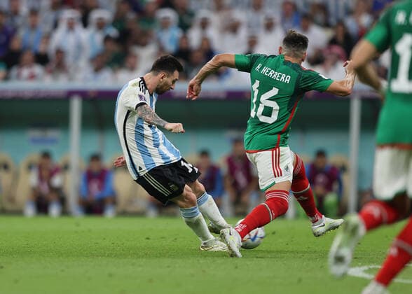 26th November 2022; Lusail Iconic Stadium, Lusail, Qatar; FIFA World Cup, WM, Weltmeisterschaft, Fussball Football, Argentina versus Mexico; Lionel Messi of Argentina shoots and scores his sides 1st goal in the 64th minute to make it 1-0  ActionPlus12453377 JohnxPatrickxFletcher