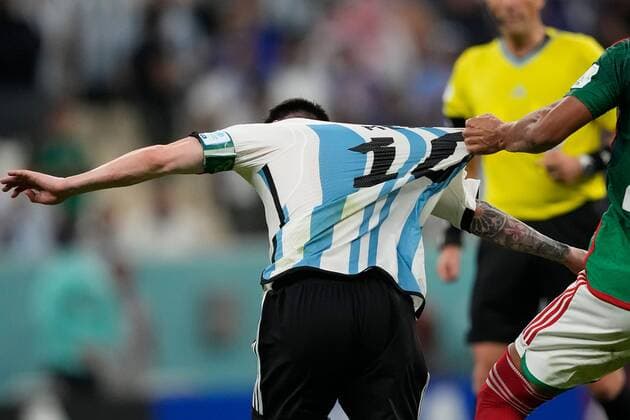 Mandatory Credit: Photo by Dave Shopland Shutterstock (13634804ch) Lionel Messi of Argentina has his shirt pulled Argentina v Mexico, FIFA World Cup, WM, Weltmeisterschaft, Fussball 2022, Group C, Football, Lusail Stadium, Al Daayen, Qatar - 26 Nov 2022 Editorial Use Only Argentina v Mexico, FIFA World Cup 2022, Group C, Football, Lusail Stadium, Al Daayen, Qatar - 26 Nov 2022 Editorial Use Only Copyright: xDavexShopland Shutterstockx 13634804ch