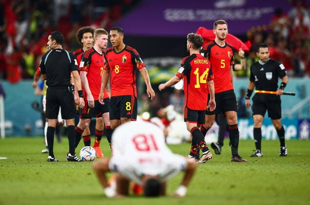 Mandatory Credit: Photo by Michael Zemanek Shutterstock (13634893cn) Belgium players look dejected at the end of the game as Jawad El Yamiq of Morocco prays in celebration Belgium v Morocco, FIFA World Cup, WM, Weltmeisterschaft, Fussball 2022, Group F, Football, Al Thumama Stadium, Doha, Qatar - 27 Nov 2022 Editorial Use Only Belgium v Morocco, FIFA World Cup 2022, Group F, Football, Al Thumama Stadium, Doha, Qatar - 27 Nov 2022 Editorial Use Only Copyright: xMichaelxZemanek Shutterstockx 13634893cn
