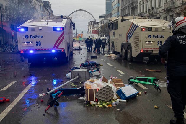 Illustration picture shows incidents and police forces present in the center of Brussels, during a soccer game between Belgium s national team, Nationalteam the Red Devils and Morocco, in Group F of the FIFA 2022 World Cup, on Sunday 27 November 2022. NICOLASxMAETERLINCK  x54153206x