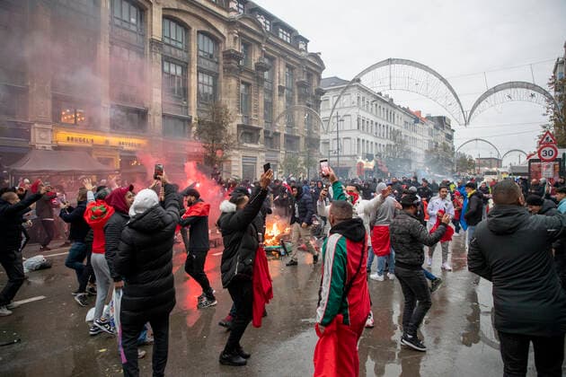 Illustration picture shows Moroccan supporters celebrate the victory in the center of Brussels, during a soccer game between Belgium s national team, Nationalteam the Red Devils and Morocco, in Group F of the FIFA 2022 World Cup, on Sunday 27 November 2022. NICOLASxMAETERLINCK  x54153230x