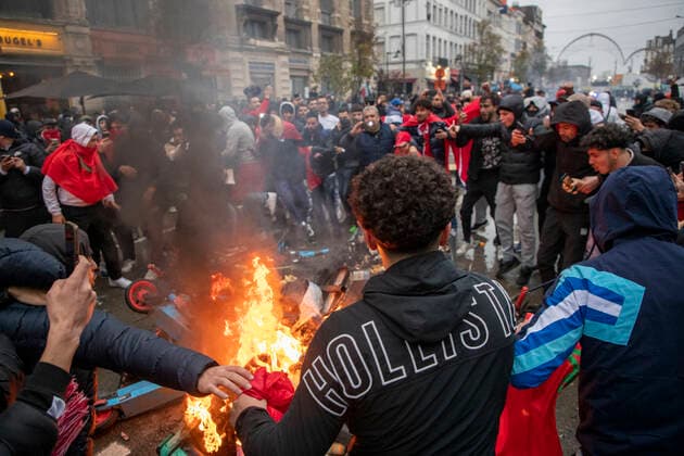 Illustration picture shows incidents during the celebrations of Moroccan supporters and police forces present in the center of Brussels, during a soccer game between Belgium s national team, Nationalteam the Red Devils and Morocco, in Group F of the FIFA 2022 World Cup, on Sunday 27 November 2022. NICOLASxMAETERLINCK  x54153254x