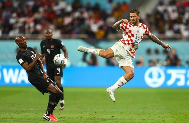 Mandatory Credit: Photo by Kieran McManus Shutterstock (13634907ar) Marko Livaja of Croatia and Atiba Hutchinson of Canada Croatia v Canada, FIFA World Cup, WM, Weltmeisterschaft, Fussball 2022, Group F, Football, Khalifa International Stadium, Ar-Rayyan, Qatar - 27 Nov 2022 Editorial Use Only Croatia v Canada, FIFA World Cup 2022, Group F, Football, Khalifa International Stadium, Ar-Rayyan, Qatar - 27 Nov 2022 Editorial Use Only Copyright: xKieranxMcManus Shutterstockx 13634907ar