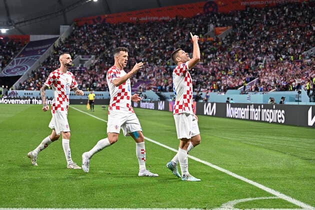 (221127) -- DOHA, Nov. 27, 2022 -- Andrej Kramaric (1st R) of Croatia celebrates for his goal during the Group F match between Croatia and Canada at the 2022 FIFA World Cup, WM, Weltmeisterschaft, Fussball at Khalifa International Stadium in Doha, Qatar, Nov. 27, 2022. ) (SP)QATAR-DOHA-2022 WORLD CUP-GROUP F-CRO VS CAN XinxYuewei 