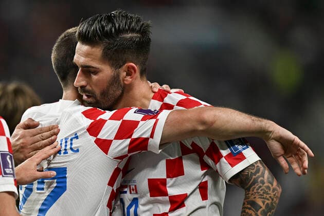 (221127) -- DOHA, Nov. 27, 2022 -- Marko Livaja (R) of Croatia celebrates for his goal during the Group F match between Croatia and Canada at the 2022 FIFA World Cup, WM, Weltmeisterschaft, Fussball at Khalifa International Stadium in Doha, Qatar, Nov. 27, 2022. ) (SP)QATAR-DOHA-2022 WORLD CUP-GROUP F-CRO VS CAN XinxYuewei 