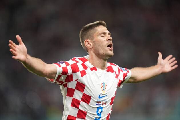 November 27, 2022, AL RAYYAN, QATAR: Croatia forward Andrej Kramaric (9) celebrates after scoring against Canada during first half group F World Cup soccer action at the Khalifa International Stadium in Al Rayyan, Qatar on Sunday, November 27, 2022. Canada News - November 27, 2022  - ZUMAc35_ 20221127_zaf_c35_043 Copyright: xNathanxDenettex