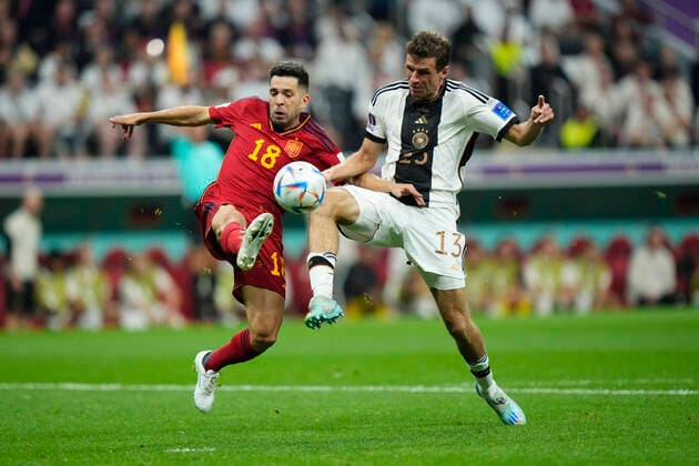 Spain v Germany: Group E - FIFA World Cup, WM, Weltmeisterschaft, Fussball Qatar 2022 Thomas Muller Second Striker of Germany and Bayern Munich and Jordi Alba left-back of Spain and FC Barcelona, Barca compete for the ball during the FIFA World Cup Qatar 2022 Group E match between Spain and Germany at Al Bayt Stadium on November 27, 2022 in Al Khor, Qatar. Al Khor Qatar  Copyright: xJosexBretonx originalFilename:breton-spainvge221127_npxQ4.jpg