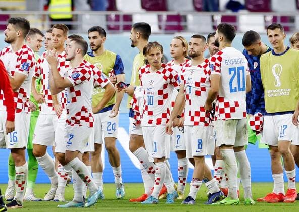 Football World Cup in Qatar Croatia players celebrate after beating Canada 4-1 in a World Cup Group F football match at Khalifa International Stadium in Doha, Qatar, on Nov. 27, 2022.  A14AA0001364880P 