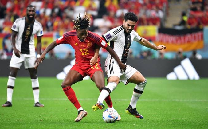 Football, World Cup, 2022, Men, Qatar, Group E, Matchday 2, Al Bayt Stadium Spain Germany 1 1 Ilkay Gündogan GER , Nico Williams SPA Action FIFA REGULATES PROHIBIT ANY USE OF PHOTOGRAPHS AS IMAGE SEQUENCES AND OR QUASI VIDEO