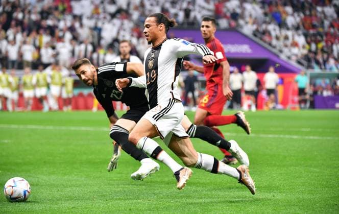 Football, World Cup, 2022, Men, Qatar, Group E, Matchday 2, Al Bayt Stadium Spain Germany 1 1 Leroy Sane GER , Unai Simon SPA Action FIFA REGULATES PROHIBIT ANY USE OF PHOTOGRAPHS AS IMAGE SEQUENCES AND OR QUASI VIDEO