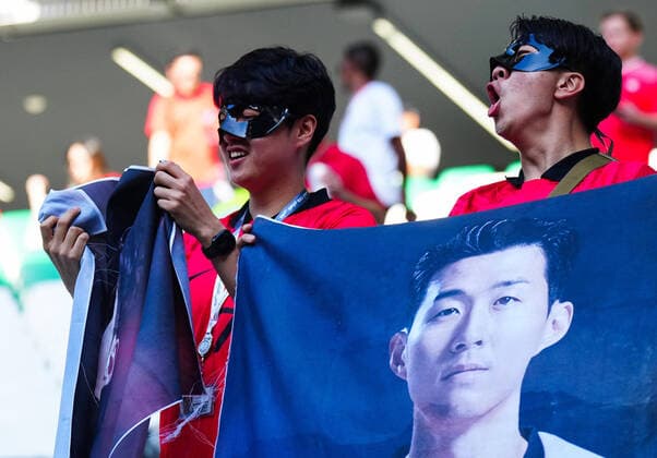 Mandatory Credit: Photo by Javier Garcia Shutterstock (13634927b) South Korean Fans enjoy the pre-match Build up with Son Heung-Min flags and masks Korea Republic v Ghana, FIFA World Cup, WM, Weltmeisterschaft, Fussball 2022, Group H, Football, Education City Stadium, Doha, Qatar - 28 Nov 2022 Editorial Use Only Korea Republic v Ghana, FIFA World Cup 2022, Group H, Football, Education City Stadium, Doha, Qatar - 28 Nov 2022 Editorial Use Only  Copyright: xJavierxGarcia Shutterstockx 13634927b