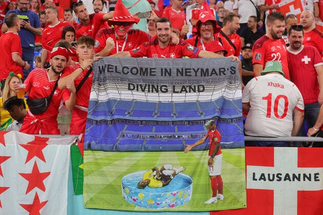 Swiss fans hold a banner during the FIFA World Cup, WM, Weltmeisterschaft, Fussball Qatar 2022 Group G match between Brazil and Switzerland at Stadium 974, Doha, Qatar on 28 November 2022. Copyright: xPeterxDovganx 34670033