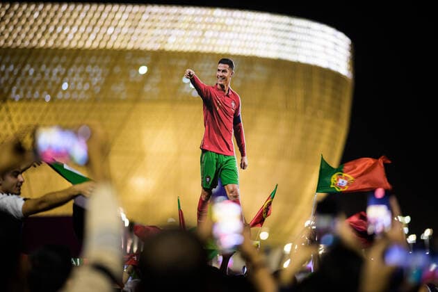 221128 Portugal fans hoist a Cristiano Ronaldo cardboard cutout ahead of the FIFA World Cup 2022 football match between Portugal and Uruguay on November 28, 2022 in Doha Photo Joel Marklund BILDBYRAN code JM JM0392 bbeng football football soccer fotball world cup football world cup football world cup 2022 fifa world cup 2022 portugal uruguay,  Copyright: JOELxMARKLUND BB221128JM005