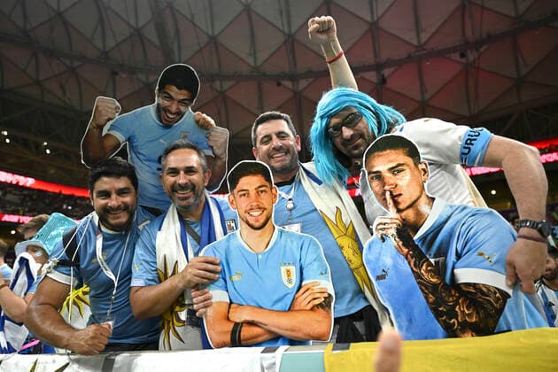 (221128) -- LUSAIL, Nov. 28, 2022 -- Fans cheer prior to the Group H match between Portugal and Uruguay at the 2022 FIFA World Cup, WM, Weltmeisterschaft, Fussball at Lusail Stadium in Lusail, Qatar, Nov. 28, 2022. ) (SP)QATAR-LUSAIL-2022 WORLD CUP-GROUP H-POR VS URU LixGa 