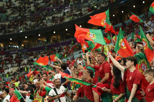 (221128) -- LUSAIL, Nov. 28, 2022 -- Fans cheer prior to the Group H match between Portugal and Uruguay at the 2022 FIFA World Cup, WM, Weltmeisterschaft, Fussball at Lusail Stadium in Lusail, Qatar, Nov. 28, 2022. ) (SP)QATAR-LUSAIL-2022 WORLD CUP-GROUP H-POR VS URU PanxYulong 