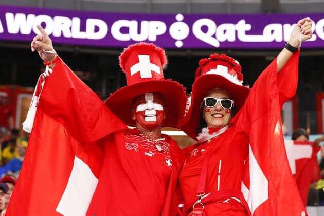 Football World Cup in Qatar Switzerland supporters cheer in the stands ahead of a World Cup Group G football match against Brazil at Stadium 974 in Doha, Qatar, on Nov. 28, 2022.  A14AA0001365646P 