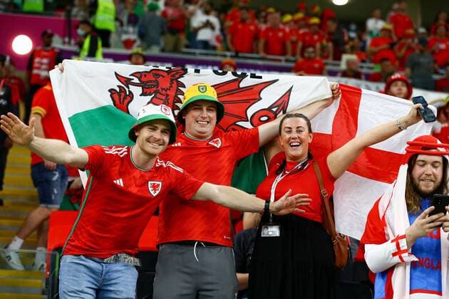 Mandatory Credit: Photo by Kieran McManus Shutterstock (13640307al) Wales and England fans look jubilent before kick-off Wales v England, FIFA World Cup, WM, Weltmeisterschaft, Fussball 2022, Group B, Football, Ahmad Bin Ali Stadium, Ar-Rayyan, Qatar - 29 Nov 2022 Editorial Use Only Wales v England, FIFA World Cup 2022, Group B, Football, Ahmad Bin Ali Stadium, Ar-Rayyan, Qatar - 29 Nov 2022 Editorial Use Only  Copyright: xKieranxMcManus Shutterstockx 13640307al