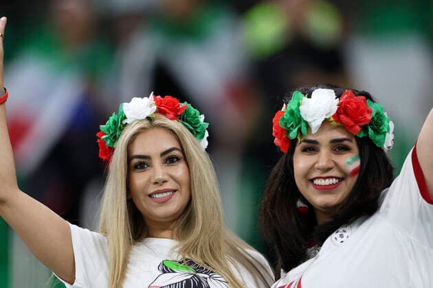 (221129) -- DOHA, Nov. 29, 2022 -- Fans of Iran cheer for the team before the Group B match between Iran and the United States at the 2022 FIFA World Cup, WM, Weltmeisterschaft, Fussball at Al Thumama Stadium in Doha, Qatar, Nov. 29, 2022. ) (SP)QATAR-DOHA-2022 WORLD CUP-GROUP B-IRN VS USA CaoxCan 