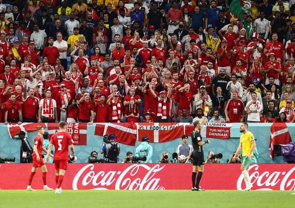 Mandatory Credit: Photo by Michael Zemanek Shutterstock (13640327dc) Denmark fans cheer as Referee Mustapha Ghorbal shows Milos Degenek of Australia a yellow card Australia v Denmark, FIFA World Cup, WM, Weltmeisterschaft, Fussball 2022, Group D, Football, Al Janoub Stadium, Al Wakrah, Qatar - 30 Nov 2022 Editorial Use Only Australia v Denmark, FIFA World Cup 2022, Group D, Football, Al Janoub Stadium, Al Wakrah, Qatar - 30 Nov 2022 Editorial Use Only  Copyright: xMichaelxZemanek Shutterstockx 13640327dc